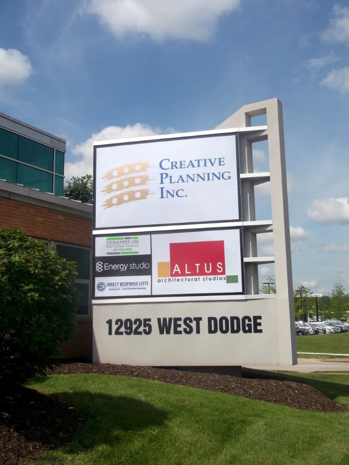 Illuminated, double-face tenant monument sign at 12925 West Dodge Road at 