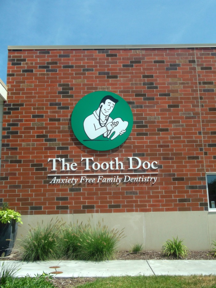 Non-illuminated flat cut out letters and logo for The Tooth Doc