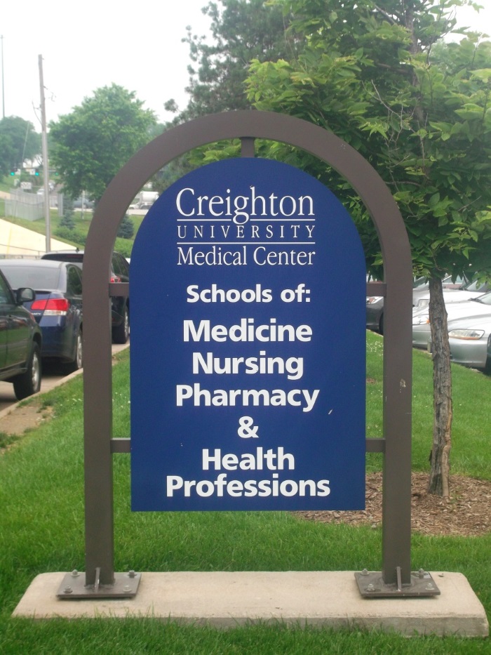 One of many double-face monument signs on the Creighton University campus