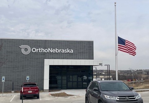 OrthoNebraska White logo Sign